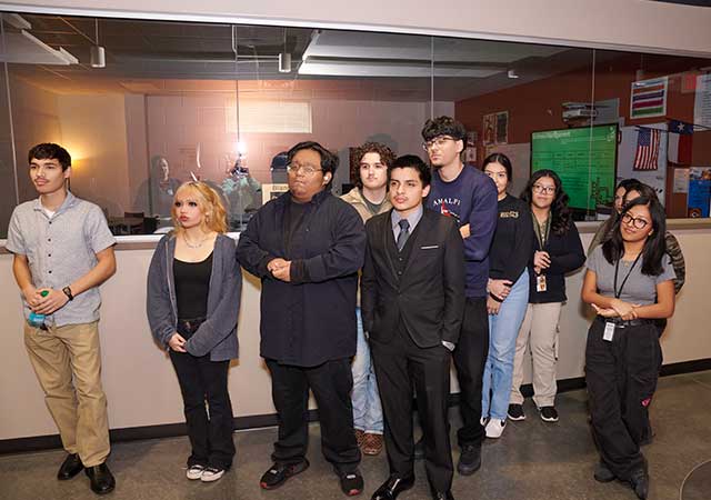 Logistics & Distribution Program 5 A group of high school students stands in the hallway, listening to North Houston District Marketing Director, Colleen Martin, explain what a management district is.