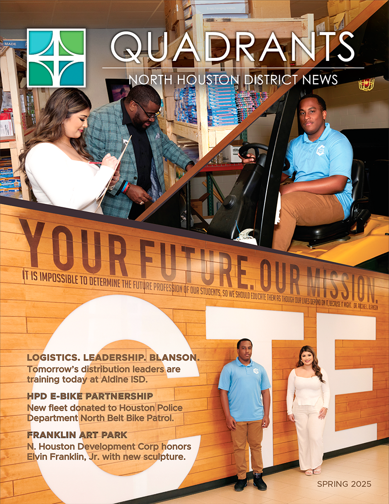 Two students stand in front of a large CTE sign with text above reading Your Future. Our Mission. in a bright, organized school space.